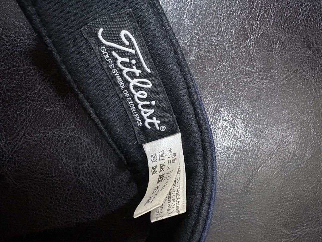 Titleist Golf Visor Navy Blue (Category: Caps & Hats) located in Quezon City. Submitted by viee04 (Listing ID 1442017322, Image 2). Description: - Navy blue Titleist visor - Embroidered logo on the front - Adjustable strap for a comfortable fit - Ideal for golf and outdoor activities - Provides sun protection for your eyes - Classic and simple design.
