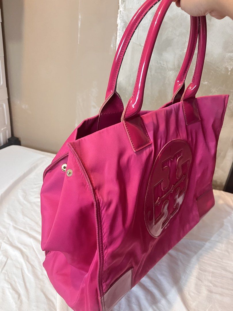 TORY BURCH HOT PINK TOTE BAG (Category: Luxury Bags & Wallets) located in Cainta. Submitted by busygirls.closet (Listing ID 1442061075, Image 3). Description: - hot pink nylon tote bag - large - has signs of usage - need cleaning.