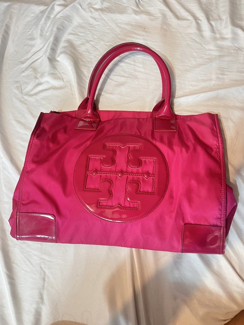 TORY BURCH HOT PINK TOTE BAG (Category: Luxury Bags & Wallets) located in Cainta. Submitted by busygirls.closet (Listing ID 1442061075, Image 2). Description: - hot pink nylon tote bag - large - has signs of usage - need cleaning.