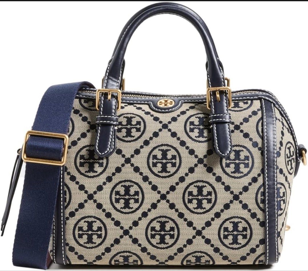 Tory Burch navy jacquard barrel bag (Category: Luxury Bags & Wallets) located in Cebu City. Submitted by forless.ph (Listing ID 1442138520, Image 1). Description: A Tory Burch shoulder bag with everyday potential, featuring a jacquard rendition of the label’s monogram and a structured barrel-style design. Tonal leather trim adds to the polished feel of this work-or-weekend bag. Moneyback guaranted! .