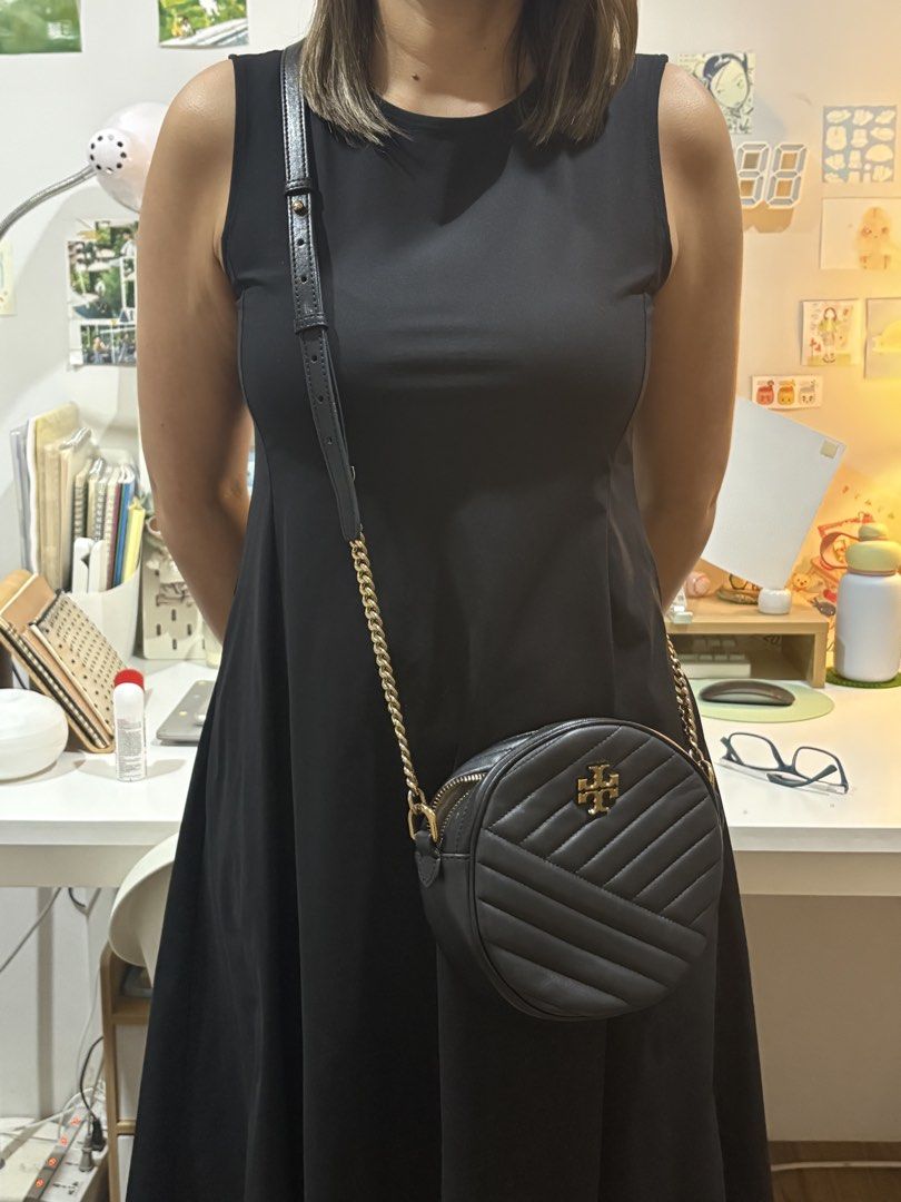 Tory Burch sling bag (Category: Shoulder Bags) located in Antipolo. Submitted by hatd0gger (Listing ID 1436222343, Image 3). Description: Pre-loved Tory Burch sling bag Price: 4k (negotiable) 🔹Round Sling bag in black color 🔹Nice in actual 🔹Gold hardware still shiny (most not tarnished) 🔹Dimensions: length (7 inches), width (bottom - 2.5 inches) 🔹With free half transparent generic dust bag RFS: Decluttering .