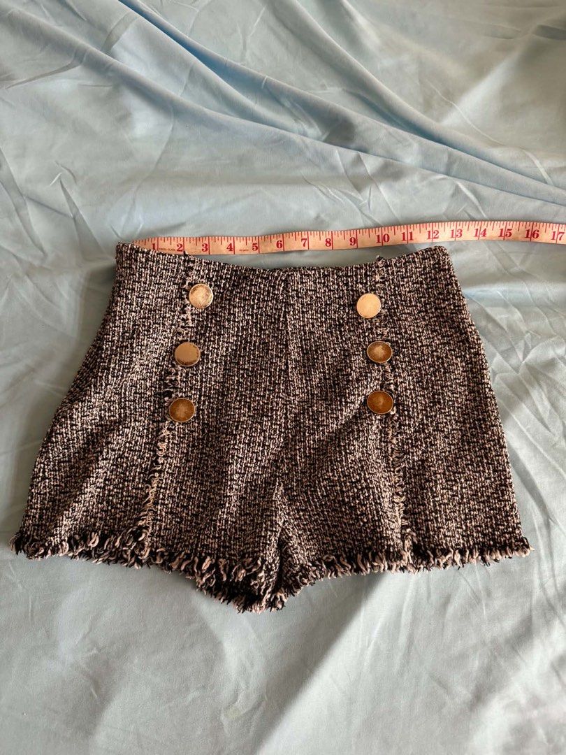 Tweed High Waisted Shorts with Button Detail (Category: Shorts) located in Legazpi City. Submitted by grechaganda (Listing ID 1442103705, Image 1). Description: - Chic high-waisted tweed shorts - Stylish decorative buttons down the front - Edgy frayed hem detail - Perfect for dressing up or down - Waist measures approximately 12 inches.