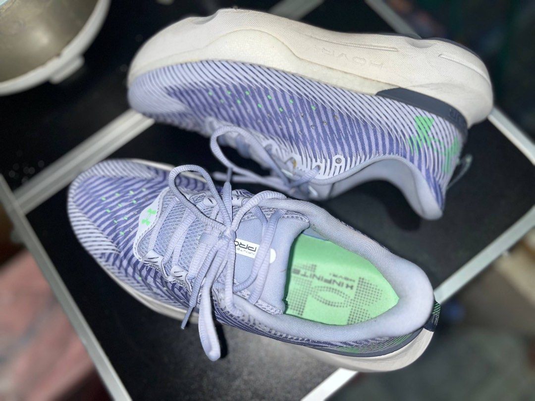 Under Armour HOVR Infinite 3 Running Shoes (Category: Sneakers) located in Makati City. Submitted by ceejaaay94 (Listing ID 1441983010, Image 3). Description: NEGOTIABLE!!! Bought it for ₱5,277.00, Selling it for only ₱2,500.00 negotiable. Good as new UNISEX - Under Armour HOVR+ running shoes - Light purple and white colorway - Breathable upper with a unique striped pattern - White sole with dark grey outsole - Cushioned midsole for comfort - Fea