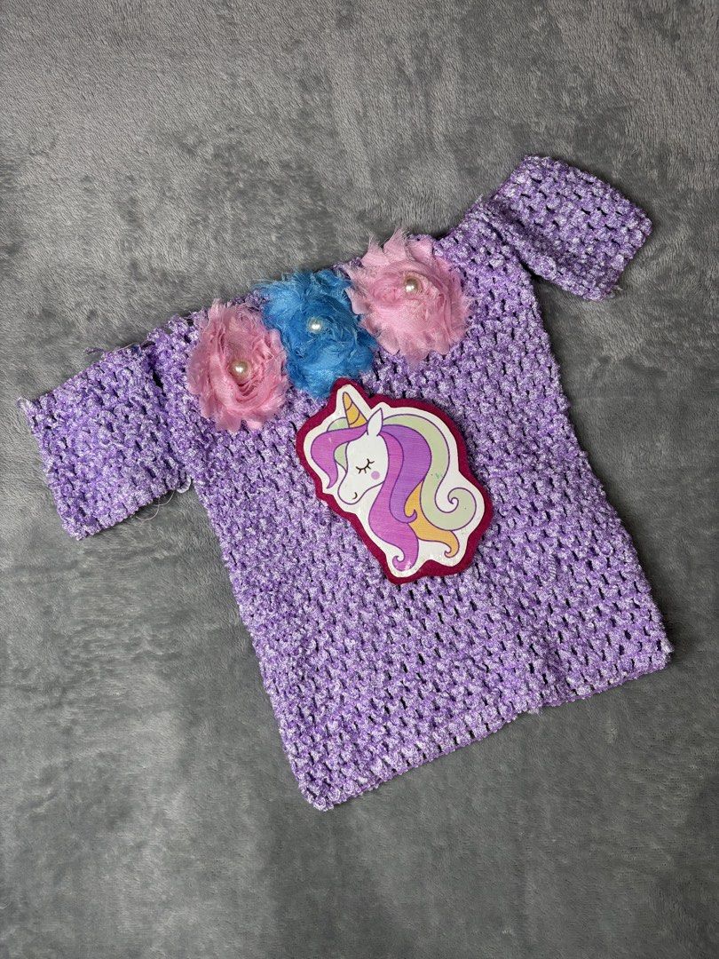 Unicorn Dress for baby (Category: Babies & Kids Fashion) located in Manila. Submitted by oddstar_862365 (Listing ID 1442012649, Image 2). Description: - Adorable handmade unicorn tutu dress - Lavender crochet top with flower and pearl embellishments - Fluffy pink and blue tutu skirt with ribbon accents - Perfect for parties and dress-up occasions - Your child will love this magical outfit!.