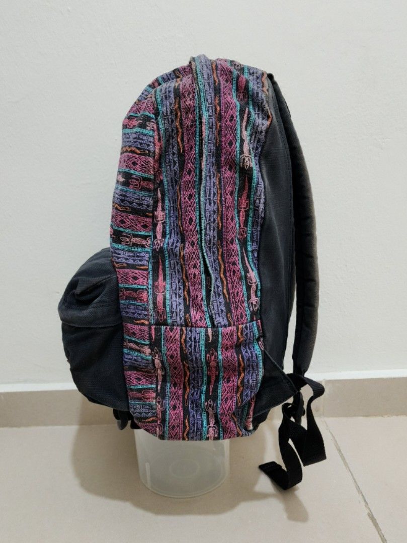 Vans Backpack (Category: Backpacks) located in Sepang. Submitted by alee73 (Listing ID 1442065708, Image 3). Description: - Vans Backpack - Bohemian pattern on the front. - Durable denim-like material on sides and back. - Comfortable padded shoulder straps. - Spacious main compartment with zip closure. - Convenient front pocket for easy access. - Sturdy and reliable for everyday use or travel. - Condition 8/10.