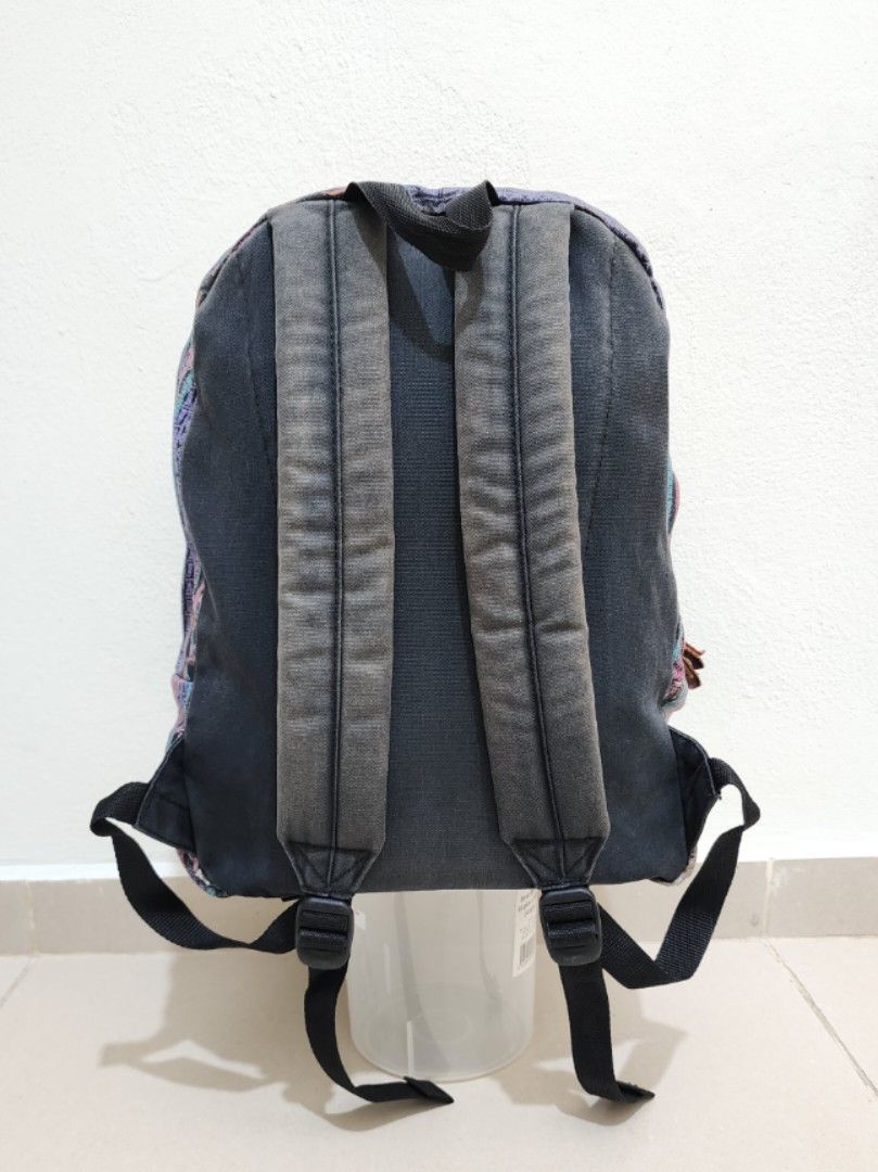 Vans Backpack (Category: Backpacks) located in Sepang. Submitted by alee73 (Listing ID 1442065708, Image 2). Description: - Vans Backpack - Bohemian pattern on the front. - Durable denim-like material on sides and back. - Comfortable padded shoulder straps. - Spacious main compartment with zip closure. - Convenient front pocket for easy access. - Sturdy and reliable for everyday use or travel. - Condition 8/10.