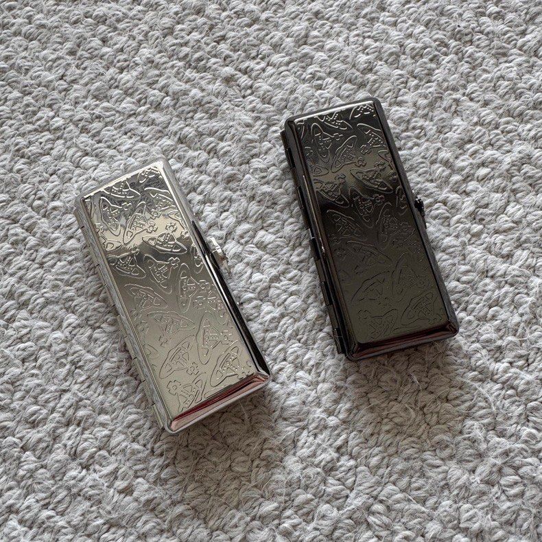 Vivienne Westwood Cigarette Case ✨ (Category: Luxury Accessories) located in Manila. Submitted by designerarchives.ph (Listing ID 1442151887, Image 2). Description: SALE | AUTHENTIC 🇯🇵 Also available: Lighter & Ashtray Dimensions: 10 x 4.5 x 1.5 🚬 Can hold 10 pieces of 🚬 with box & dustbag - 7 to 10 days ETA - 50% dp is required to order and ship in Ph - Buyer will shoulder local shipping - No return or exchange.
