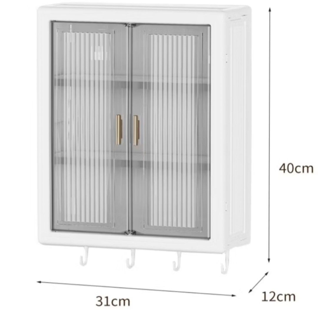 Wall Mounted Storage Cabinet with Hooks (Category: Shelves, Cabinets & Racks) located in Manila. Submitted by weyt_k (Listing ID 1442079488, Image 1). Description: - White wall hanging storage cabinet - Features two clear doors with ribbed texture - Includes 4 hooks at the bottom for hanging - Ideal for organizing cosmetics, skincare, and small items - Dimensions: 31cm (W) x 40cm (H) x 12cm (D) - Keeps your space neat and tidy.
