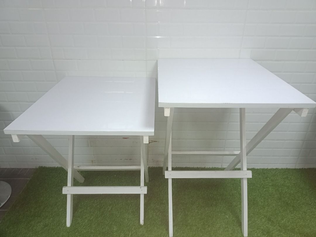 White Folding Tables (Set of 2) (Category: Tables & Sets) located in Caloocan City. Submitted by moreventures_1024 (Listing ID 1442056786, Image 1). Description: - Set of 2 white folding tables - Ideal for small spaces or extra surface area - Larger table on the right, smaller table on the left - Folds up easily for convenient storage - PHP 720 per piece (5pcs available small & 5pcs available big).