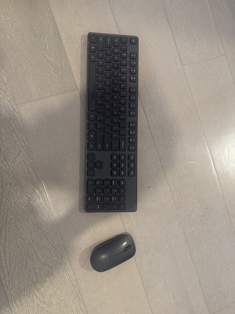 Wireless Keyboard and Mouse Combo (Category: Computer Keyboard) located in Makati City. Submitted by plitz13 (Listing ID 1442081105, Image 1). Description: - Xiaomi Wireless Keyboard and Mouse Set - Color: Dark Grey - Both items in excellent working condition - Keyboard features a full number pad - Ideal for home or office use - Reliable wireless connectivity - Selling as a complete set.