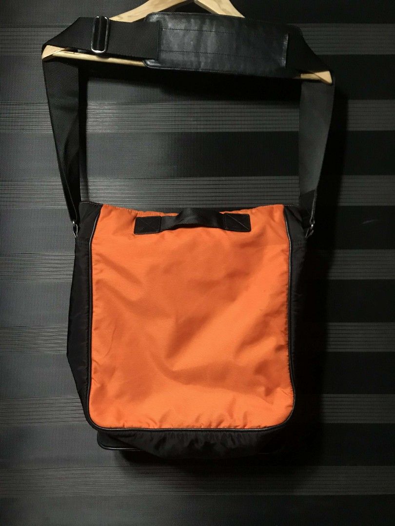 Y-3 x Adidas (Yohji Yamamoto) leather trimmed messenger bag features dual front zippered pockets (Category: Sling Bags) located in Caloocan City. Submitted by anthriftdepot (Listing ID 1442112242, Image 3). Description: Y-3 x Adidas Yohji Yamamoto leather trimmed messenger bag features dual front zippered pockets In Excellent condition Almost new See photo for reference Feel free to offer.