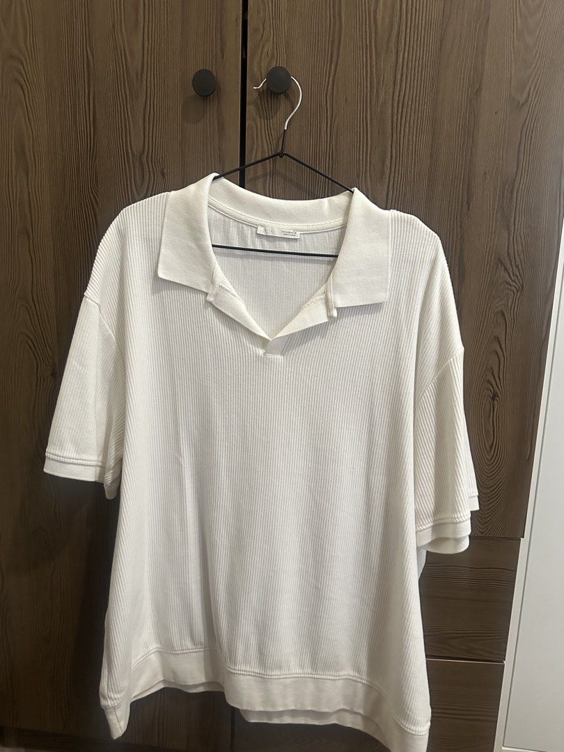 Zara Ribbed Polo Shirt White (Category: Shirts) located in Cavite. Submitted by kaydacanay (Listing ID 1442079953, Image 1). Description: - Zara white ribbed polo shirt - Short sleeves - Classic collar - Relaxed fit - Ideal for casual wear - Versatile styling - Comfortable fabric.