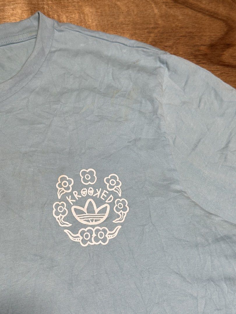 Adidas x Krooked Shirt (Category: Tshirts & Polo Shirts ) located in Bacolod City. Submitted by dannnsoy (Listing ID 1442290564, Image 2). Description: Adidas x Krooked Shirt •In very good condition •Dimension: 22.5” x 28” •Price: 499 only 📍Note: Color may vary to due lighting and camera resolution. .