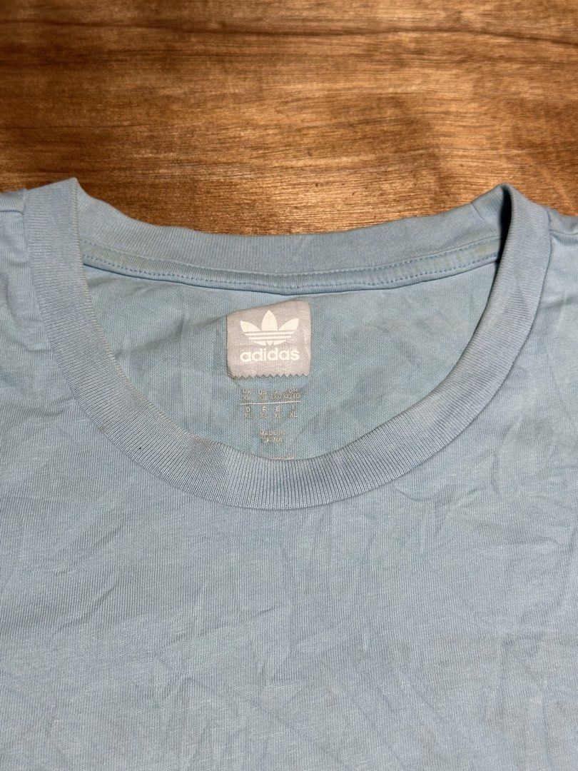Adidas x Krooked Shirt (Category: Tshirts & Polo Shirts ) located in Bacolod City. Submitted by dannnsoy (Listing ID 1442290564, Image 3). Description: Adidas x Krooked Shirt •In very good condition •Dimension: 22.5” x 28” •Price: 499 only 📍Note: Color may vary to due lighting and camera resolution. .