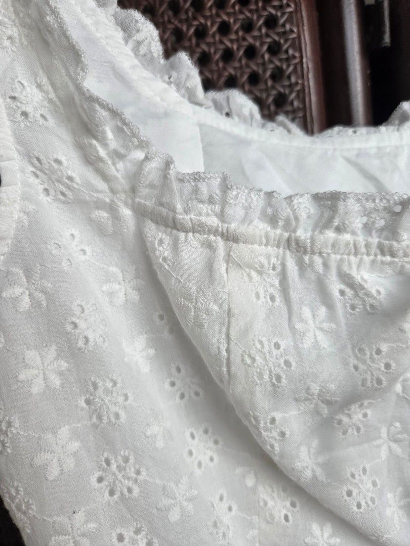 Air Space White Eyelet Corset-like Top (Category: Sleeveless) located in Caloocan City. Submitted by louvella (Listing ID 1442280592, Image 3). Description: - White eyelet top with lace details - Brand new, never worn, with tags ( tags to be removed before shipping as all items will be washed before shipping) - Brand: Air Space - Features tie closure - Delicate ruffled trim - Dainty top, coquette style.