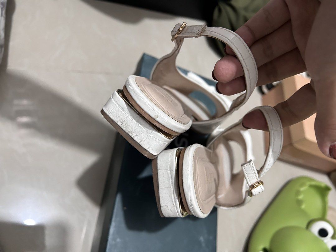 ALBERTO White Anya Sandals EU 38 US 7 (Category: Sandals) located in Taguig. Submitted by Yanyann (Listing ID 1442265645, Image 2). Description: - Brand: ALBERTO - Style Name: Anya - Size: EU 38 / US 7 - Features: Crocodile texture on platform, buckle strap closure .