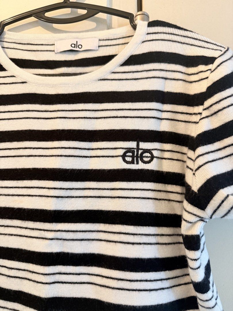 Alo Striped T-shirt (Bangkok) (Category: Shirts) located in Singapore. Submitted by blackvelma (Listing ID 1442193348, Image 2). Description: - Alo t-shirt - Black and white stripes - Embroidered Alo logo on chest - Short sleeves - Crew neck - Comfortable and casual - Perfect for everyday wear.