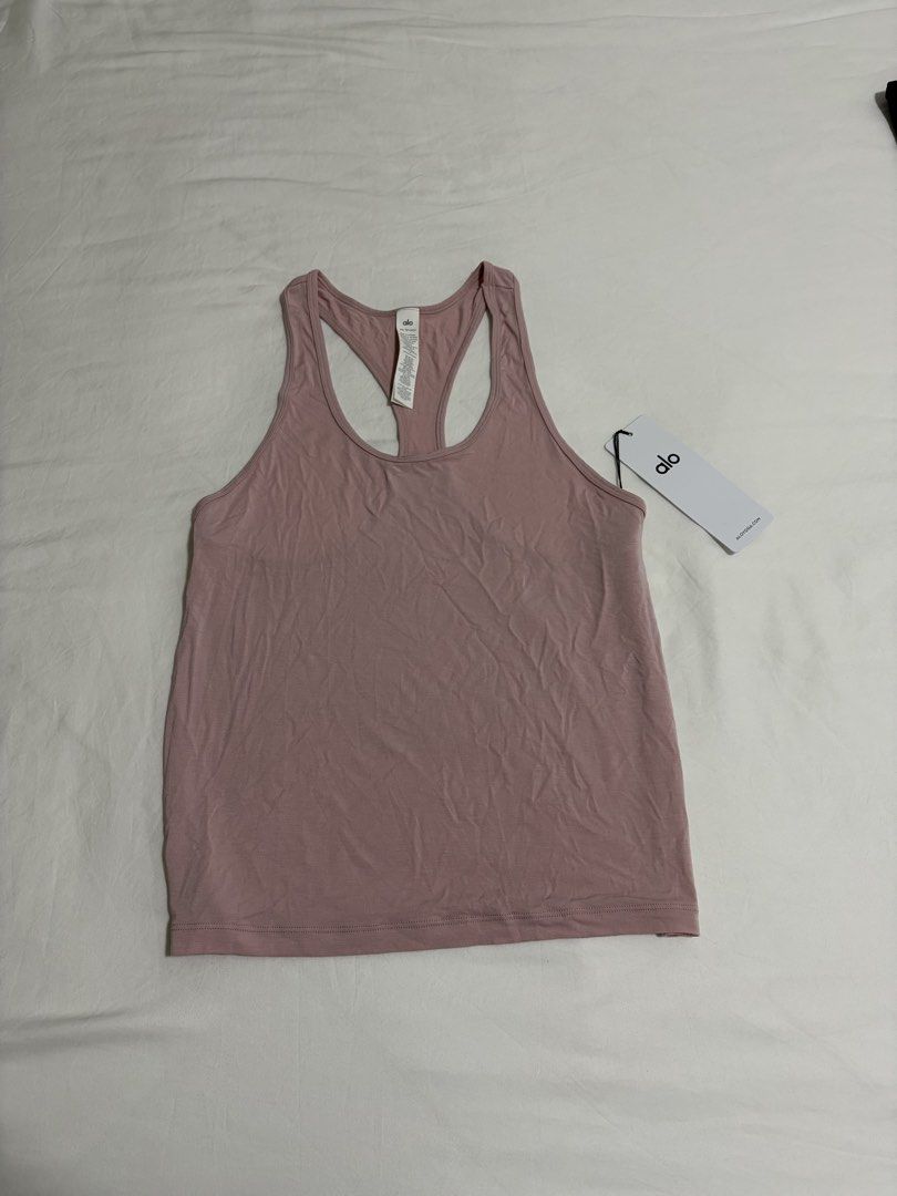 Alo Yoga All Day Tank Top Dusty Rose XS/TP/ECH (Category: Activewear) located in Singapore. Submitted by carlitojuan (Listing ID 1442289669, Image 2). Description: - Brand: Alo Yoga - Style: All Day Tank - Color: Dusty Rose - Material: 93% Modal, 7% Elastane - Features: Super soft, stretchy fabric, racerback design - Perfect for: Workouts or casual wear - Condition: New with tags attached - Meet up Tg Katong area Mailing included.