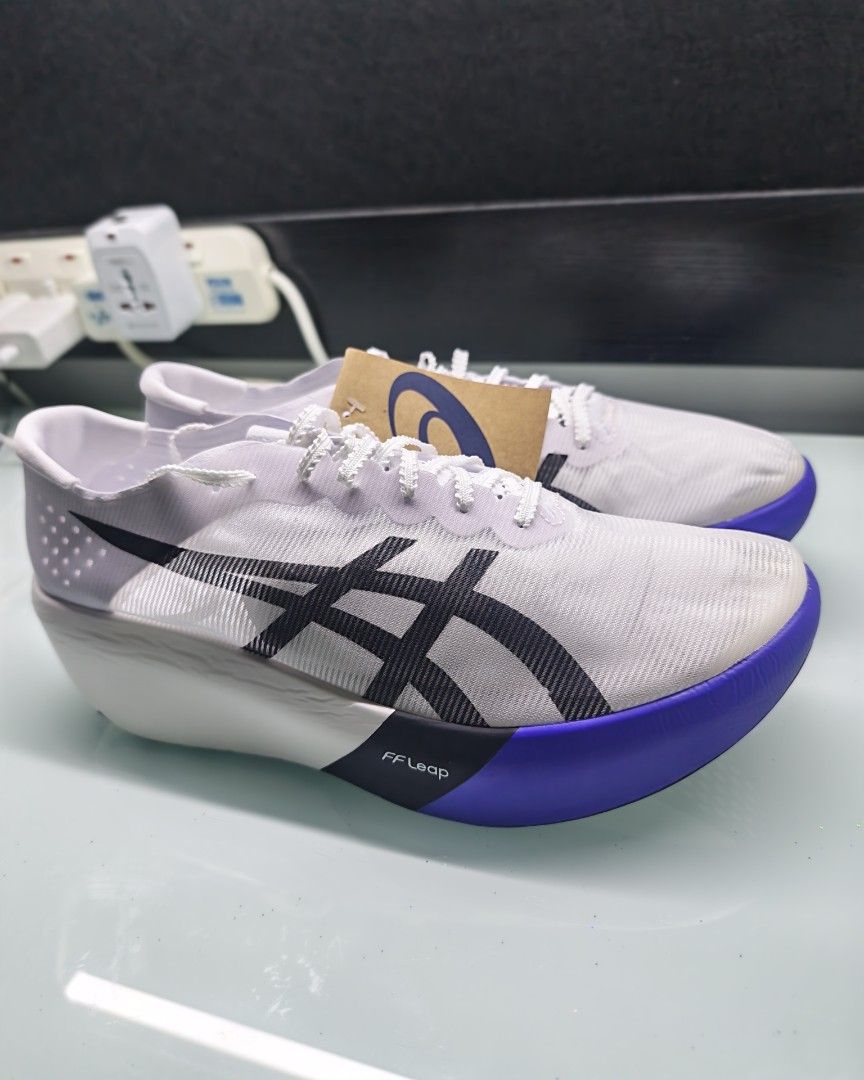 ASICS METASPEED RAY Running Shoes White Cobalt Burst (Category: Sneakers) located in Singapore. Submitted by psk91 (Listing ID 1442301656, Image 2). Description: - BRAND NEW - Original Price 429 - The ASICS Metaspeed Ray is a featherweight, highly cushioned race day shoe designed for fast, midfoot, or forefoot strikers - Color: White Coblast sole accents - Technology: FF Leap - Condition: Brand new with original tags - Ideal for: Racing/Running -