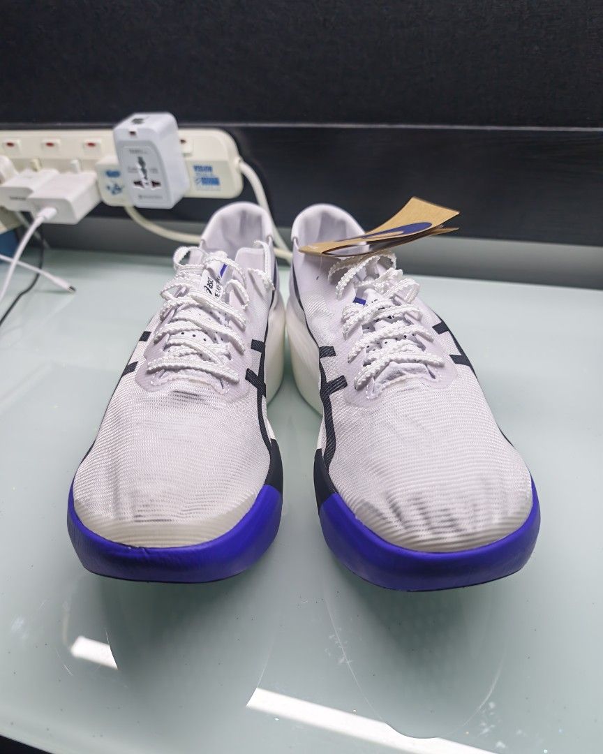 ASICS METASPEED RAY Running Shoes White Cobalt Burst (Category: Sneakers) located in Singapore. Submitted by psk91 (Listing ID 1442301656, Image 1). Description: - BRAND NEW - Original Price 429 - The ASICS Metaspeed Ray is a featherweight, highly cushioned race day shoe designed for fast, midfoot, or forefoot strikers - Color: White Coblast sole accents - Technology: FF Leap - Condition: Brand new with original tags - Ideal for: Racing/Running -