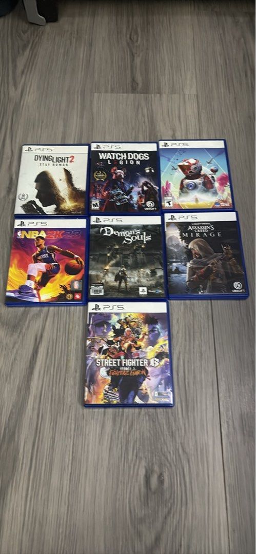 Assorted ps5 games (Category: PlayStation) located in Binan City. Submitted by rre1yes (Listing ID 1442193994, Image 1). Description: * Watch Dogs Legion — ₱900 * Dying Light 2 — ₱1,100 * No Man’s Sky — ₱1,400 * NBA 2K23 — ₱700 * Demon’s Souls — ₱1,700 * Assassin’s Creed Mirage — ₱1,400 * Street Fighter 6 Years 1–2 Edition — ₱2,200 Open for trading Lahat Gcash and Lalamove Pwede.