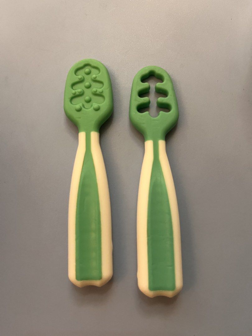 Baby Teethers and Training Spoons Set (Category: Weaning & Toddler Feeding) located in Manila. Submitted by freecrystal.28ce36 (Listing ID 1442231822, Image 1). Description: - All teethets are bought in SM dept store. -Set includes banana teether, ring teethers, and 2 training spoons (green & white). - Ideal for soothing sore gums during teething. - Encourages baby's first steps towards self-feeding. - All items are thoroughly cleaned and sanitiz
