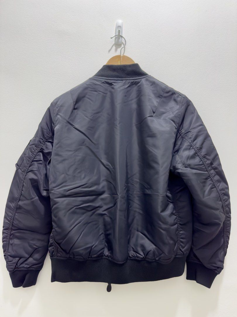 Uniqlo U Black MA-1 Bomber Jacket (Category: Coats, Jackets and Outerwear) located in Valenzuela. Submitted by zuubee (Listing ID 1442248553, Image 2). Description: Uniqlo Classic black MA-1 bomber jacket Padded Size S Decluttering Php 1,500 + shipping.