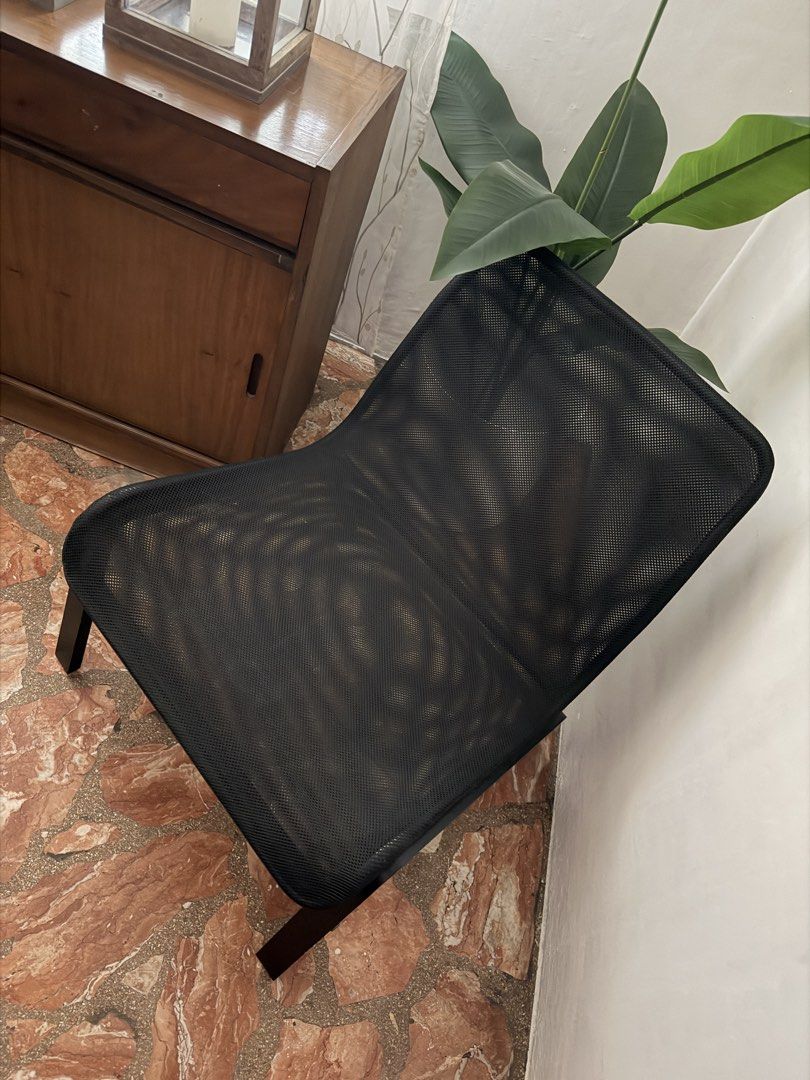 Black Mesh Lounge Chair with Black Frame (Category: Chairs) located in Paranaque City. Submitted by johnber (Listing ID 1442183754, Image 3). Description: - Ikea - Modern black mesh lounge chair - Comfortable curved seat and back - Sturdy black frame - Perfect for living rooms or offices - Easy to clean mesh material - Adds a contemporary feel.