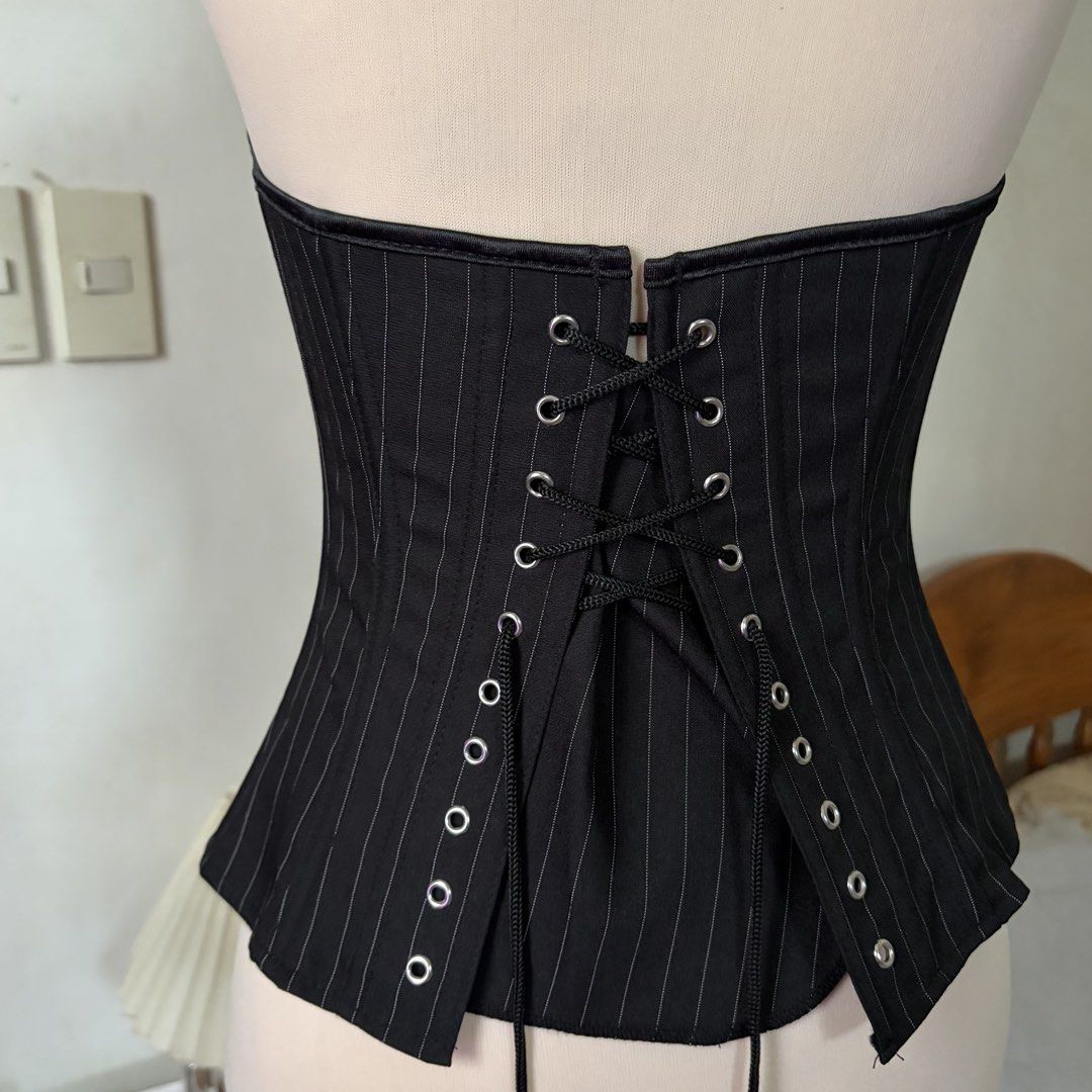 Black Pinstripe Bustier Boned Corset Top (Category: Sleeveless) located in Bambang. Submitted by gigisells_ (Listing ID 1442281079, Image 3). Description: size Small bought for 800+ rfs: wrong size with side zipper for easy wear structured with boning.