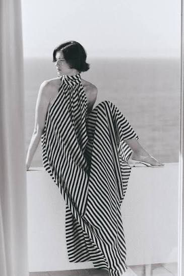 Blue Maxi Dress (Category: Dresses) located in Manila. Submitted by paperthread (Listing ID 1442232983, Image 3). Description: - Long flowing maxi dress - Bold black and white stripe pattern - Halter neckline with tie-back - Beautifully draping fabric - Ideal for beach vacations or summer evenings - Comfortable and stylish - size XS but fits up to Medium frame - perfect for wedding guests on beach or summer themed parties - bought at ₱2,990.