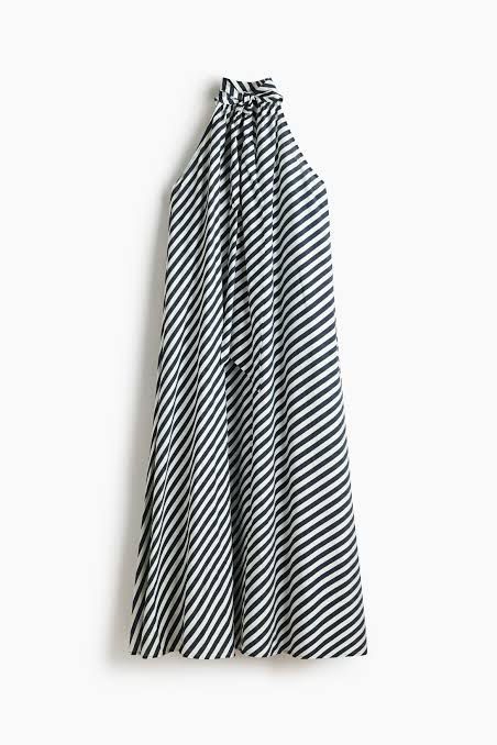 Blue Maxi Dress (Category: Dresses) located in Manila. Submitted by paperthread (Listing ID 1442232983, Image 1). Description: - Long flowing maxi dress - Bold black and white stripe pattern - Halter neckline with tie-back - Beautifully draping fabric - Ideal for beach vacations or summer evenings - Comfortable and stylish - size XS but fits up to Medium frame - perfect for wedding guests on beach or summer themed parties - bought at ₱2,990.
