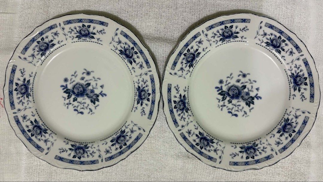 Blue Rose China Breakfast Plates - Scalloped Edge (Category: Dinnerware & Cutlery) located in Manila. Submitted by arichives (Listing ID 1442320839, Image 1). Description: -Blue Rose China Breakfast Plates - Scalloped Edge -Set of 2 -Origin: Made in China -Design: Beautiful blue rose botanical print on white ceramic plate. -Condition: Excellent vintage condition. No visible chips, cracks, or staining..