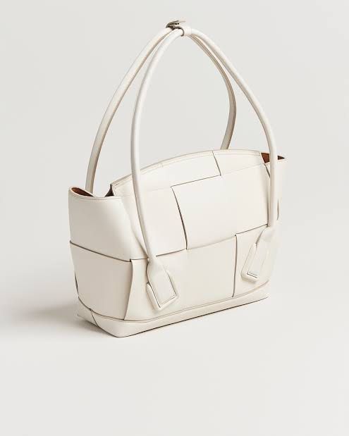 Bottega Veneta Mini Arco Tote (Category: Luxury Bags & Wallets) located in Taguig. Submitted by sourcedbym (Listing ID 1442204706, Image 2). Description: Retail 128k Comes complete with cards and dustbag Has extra strap for crossbody Minor rubbings on the back but otherwise excellent condition.