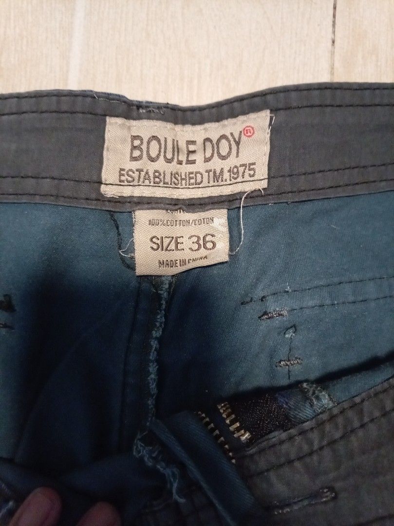 BOULE DOY Camouflage Cargo Shorts Size 36 (Category: Shorts) located in Manila. Submitted by sainty.exe (Listing ID 1442180937, Image 2). Description: - Brand: BOULE DOY - Size: 36 - Color/Pattern: Blue Camouflage 6 Pockets - Material: 60% Cotton, 40% Polyester - Features: Multiple side cargo pockets - Style: Casual wear.