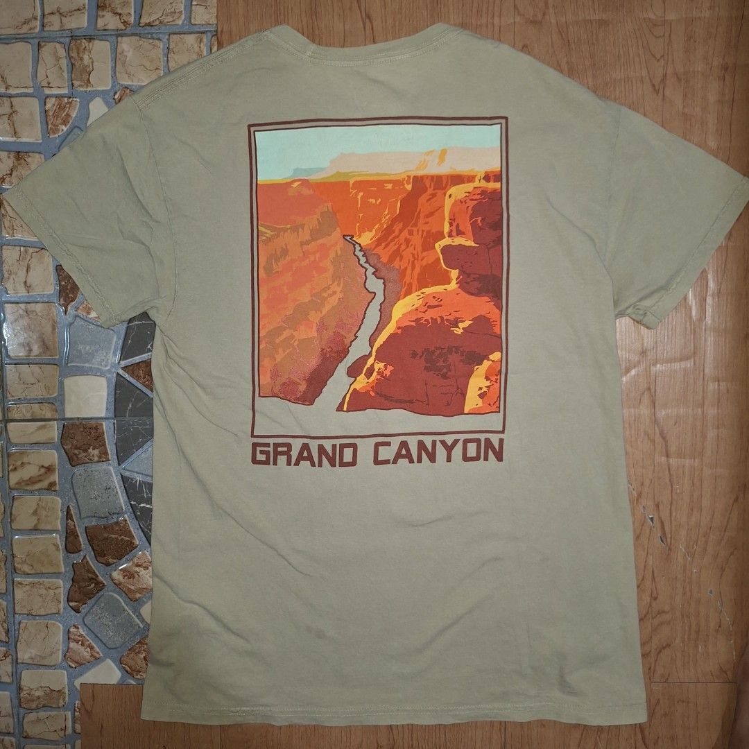 Bowery Supply Co. Grand Canyon (Category: Tshirts & Polo Shirts ) located in Aroroy. Submitted by rewear_r3volution (Listing ID 1442333549, Image 3). Description: This is a tan Bowery Supply Co. t-shirt featuring a stylized Grand Canyon graphic on the back..