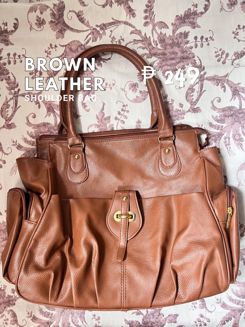 Brown Vintage Leather shoulder bag (Category: Tote Bags) located in Manila. Submitted by ashleyplum (Listing ID 1442323212, Image 1). Description: ~ no COD (payment first) ~ laguna based ~ JNT courier ~ color may vary due to lighting ~ no ww message for the details and more information 🪷.