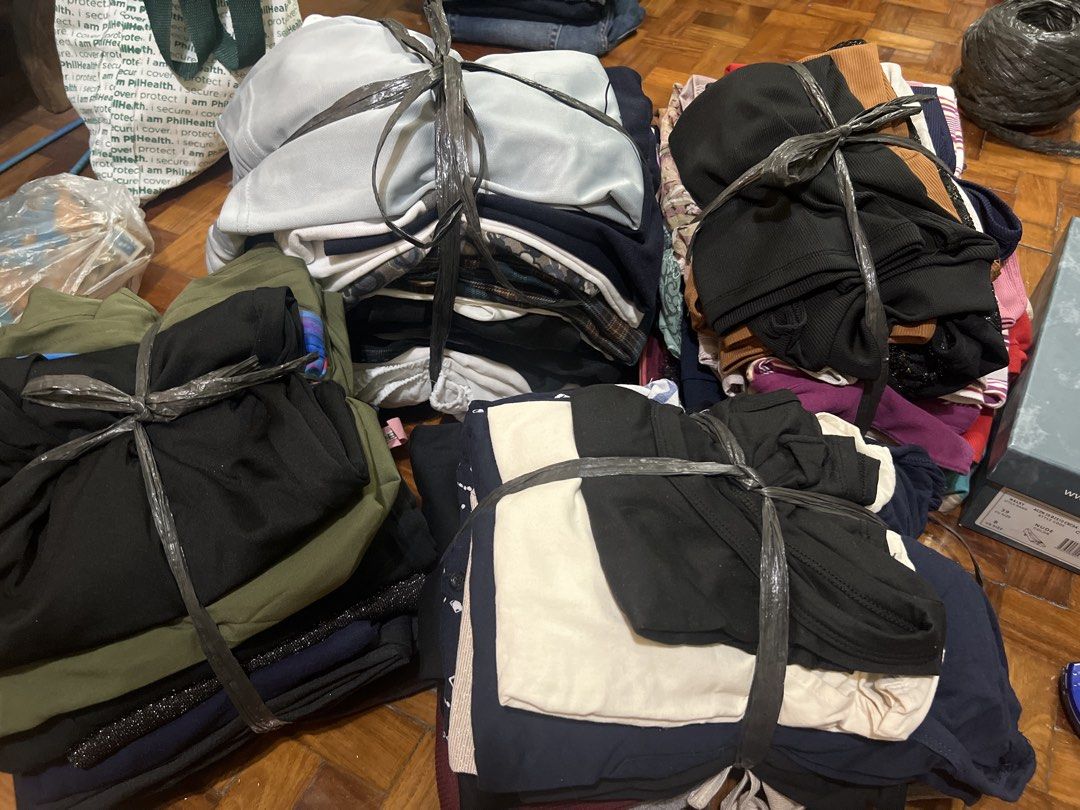 Bundle of assorted clothes, tops, pants, and more (Category: Others Tops) located in Pasig City. Submitted by roxge (Listing ID 1442248231, Image 1). Description: - 50+ clothing items combination of pants, dress and tops -some items are well used but some lightly used - sizes varies to small to xl *this are all used clothes please expect some damages on the clothes. .