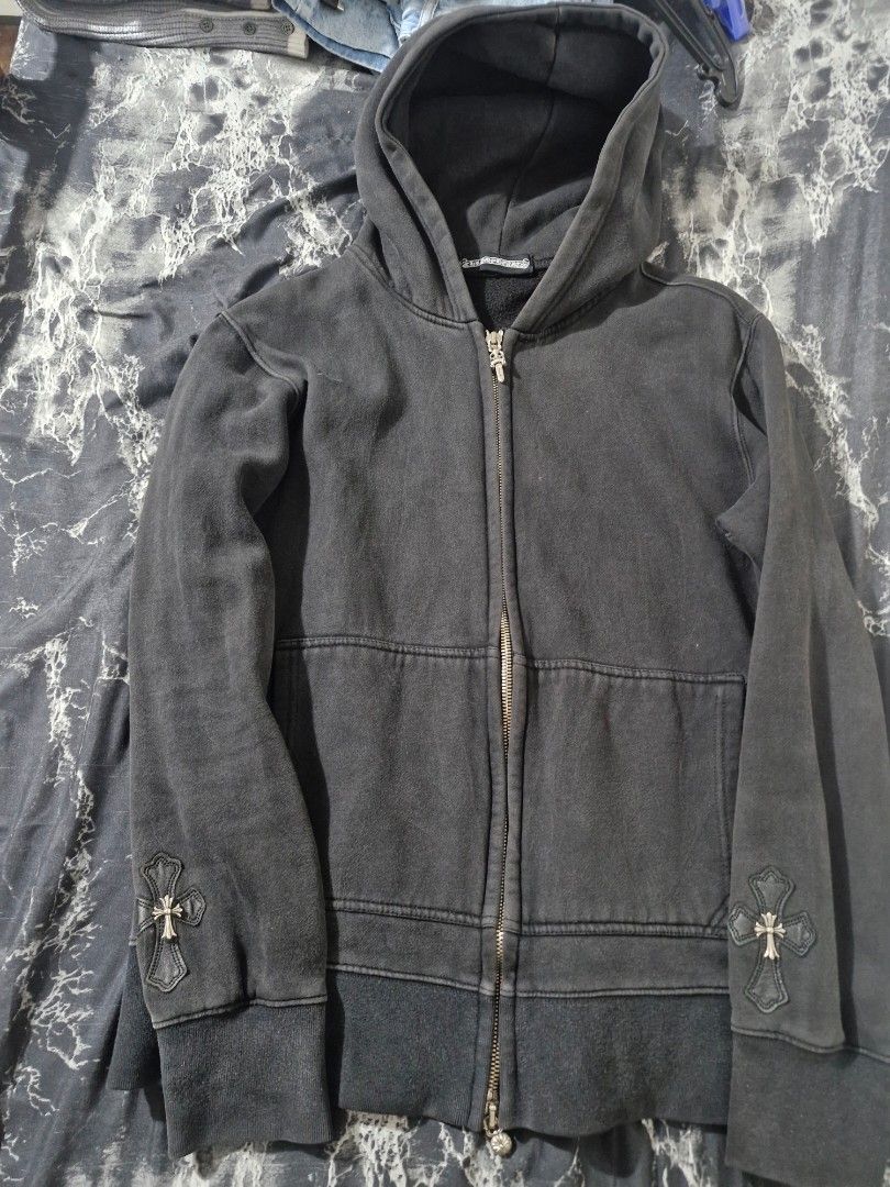 Chrome Hearts Black Zip-Up Hoodie (Category: Hoodies) located in Manila. Submitted by blackstarharpoon (Listing ID 1442324608, Image 1). Description: - Black zip-up hoodie - Features iconic Chrome Hearts cross embellishments on cuffs - Chrome Hearts logo on zipper pull - Comfortable and stylish - Ideal for layering NEGOTIABLE good for PSG.