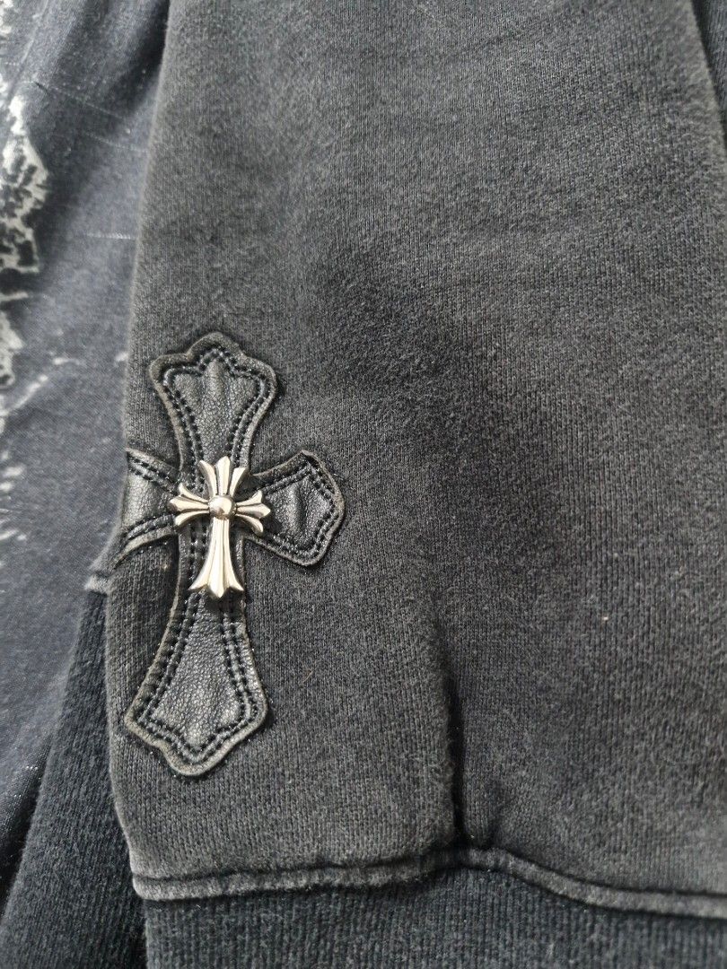 Chrome Hearts Black Zip-Up Hoodie (Category: Hoodies) located in Manila. Submitted by blackstarharpoon (Listing ID 1442324608, Image 2). Description: - Black zip-up hoodie - Features iconic Chrome Hearts cross embellishments on cuffs - Chrome Hearts logo on zipper pull - Comfortable and stylish - Ideal for layering NEGOTIABLE good for PSG.