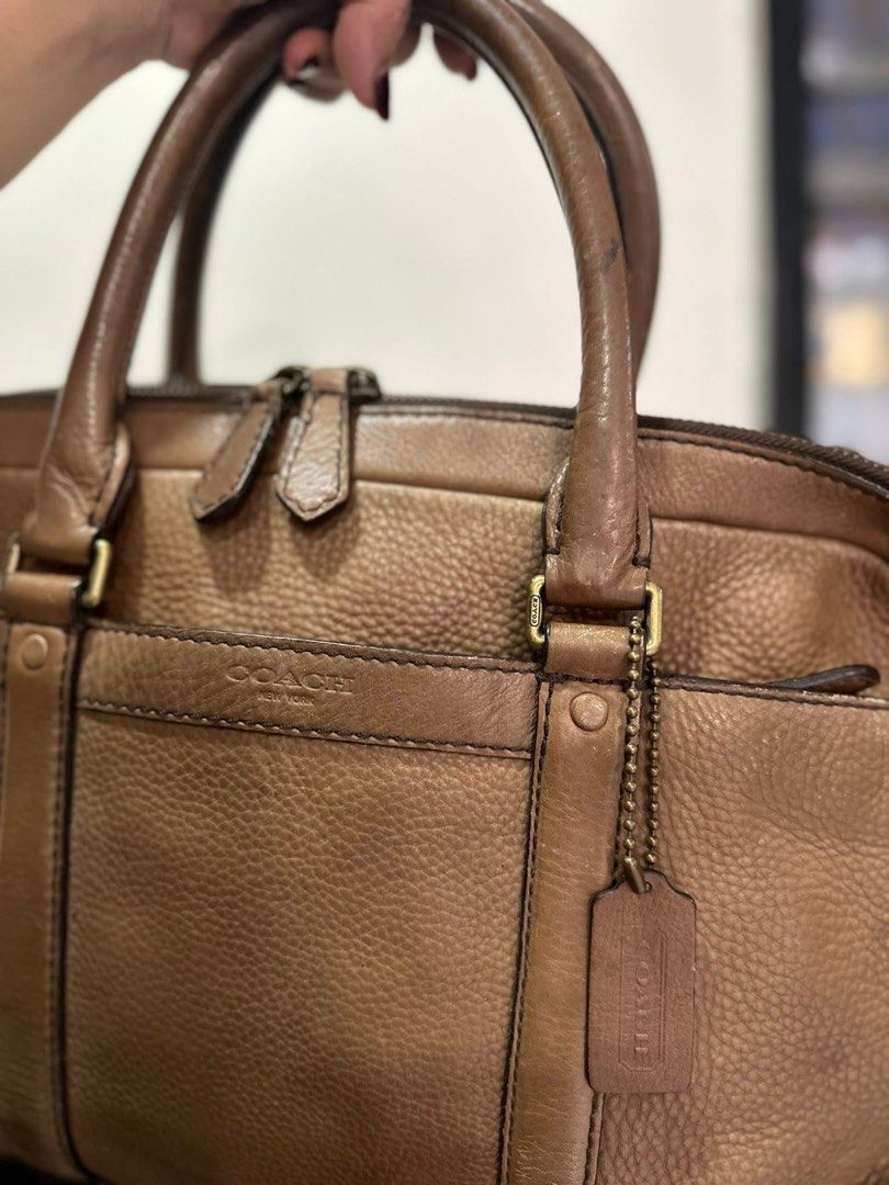 Coach laptop Bag (Category: Luxury Bags & Wallets) located in Cavite. Submitted by jkprelovebags (Listing ID 1442204471, Image 2). Description: Authentic Coach Bleecker Slim Brief in Pebbled Leather. : Business bag, Briefcase : A4 size compatible. Commuting to work or school. Bag Large Capacity ○ Size 28.5cm (height) Width 40.5cm Depth: 5.5cm Handle 49cm 8/10 in Good Condition no Cracking malinis loob issue sign of used lang Kung maarte ka recolo