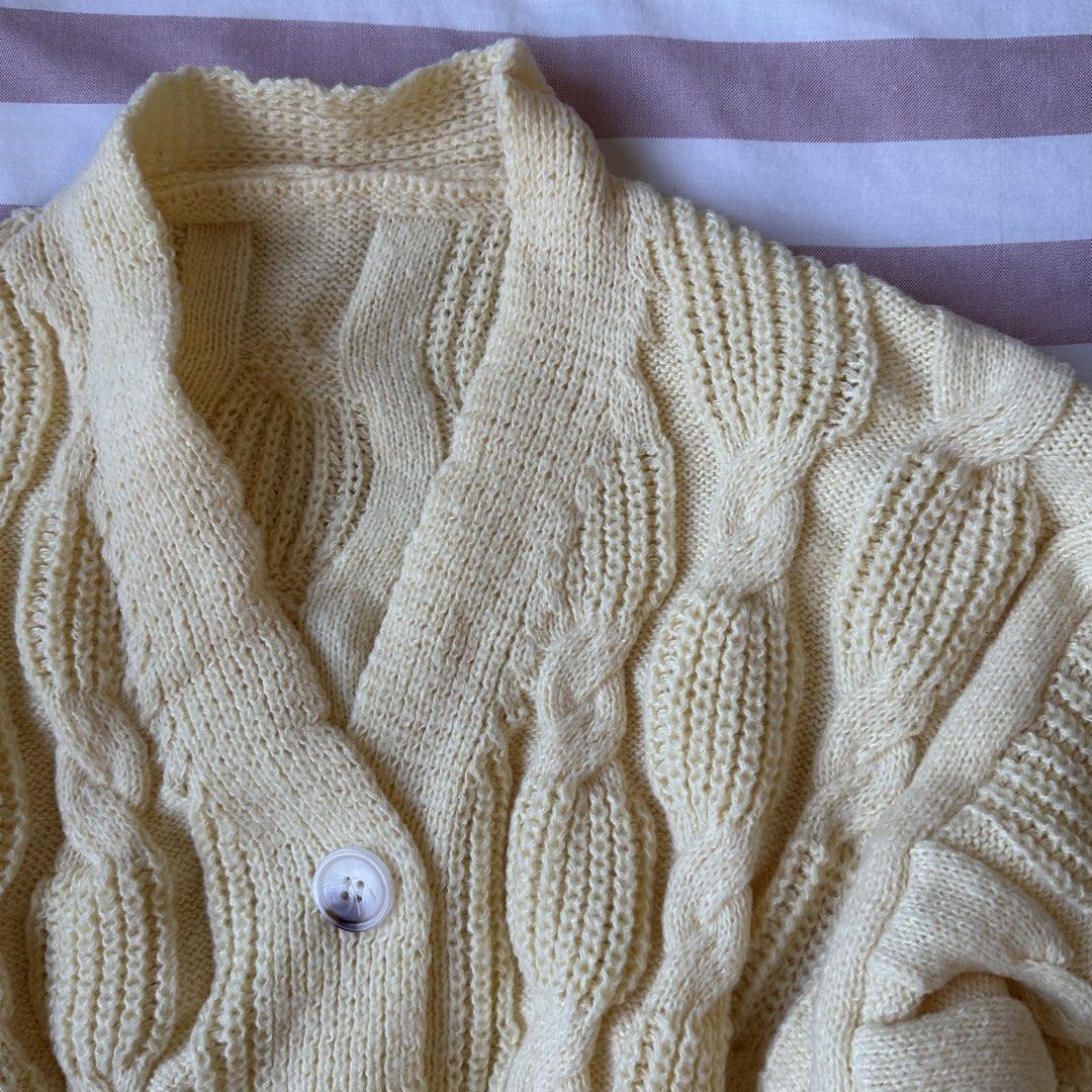 Cream Cable Knit Cropped Cardigan (Category: Coats, Jackets and Outerwear) located in Davao. Submitted by beys.corner (Listing ID 1442162204, Image 2). Description: - Cute cream cable knit cardigan - Cropped style - Button front closure - Super cozy and warm - Ideal for layering over tops or dresses - Lovely textured knit detail - Versatile for dressing up or down.