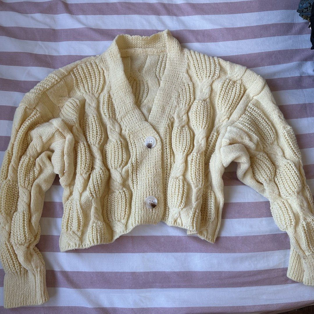 Cream Cable Knit Cropped Cardigan (Category: Coats, Jackets and Outerwear) located in Davao. Submitted by beys.corner (Listing ID 1442162204, Image 1). Description: - Cute cream cable knit cardigan - Cropped style - Button front closure - Super cozy and warm - Ideal for layering over tops or dresses - Lovely textured knit detail - Versatile for dressing up or down.