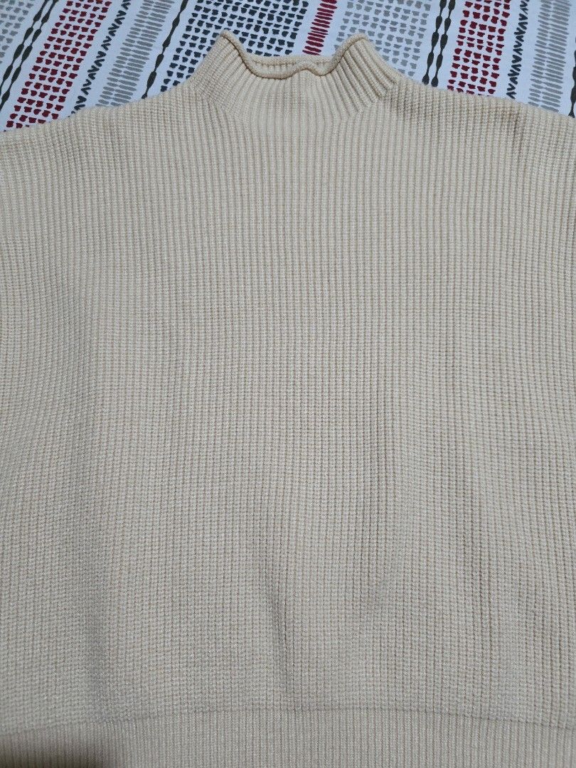 Cream Ribbed Mock Neck Sweater Size S (Category: Blouses) located in Las Pinas. Submitted by luxeprelovedstuff (Listing ID 1442288000, Image 2). Description: - Cream colored sweater - Mock neck - Cozy ribbed knit - Made with a comfortable 95% cotton, 5% polyester blend - Size S - Washing instructions available on tag.