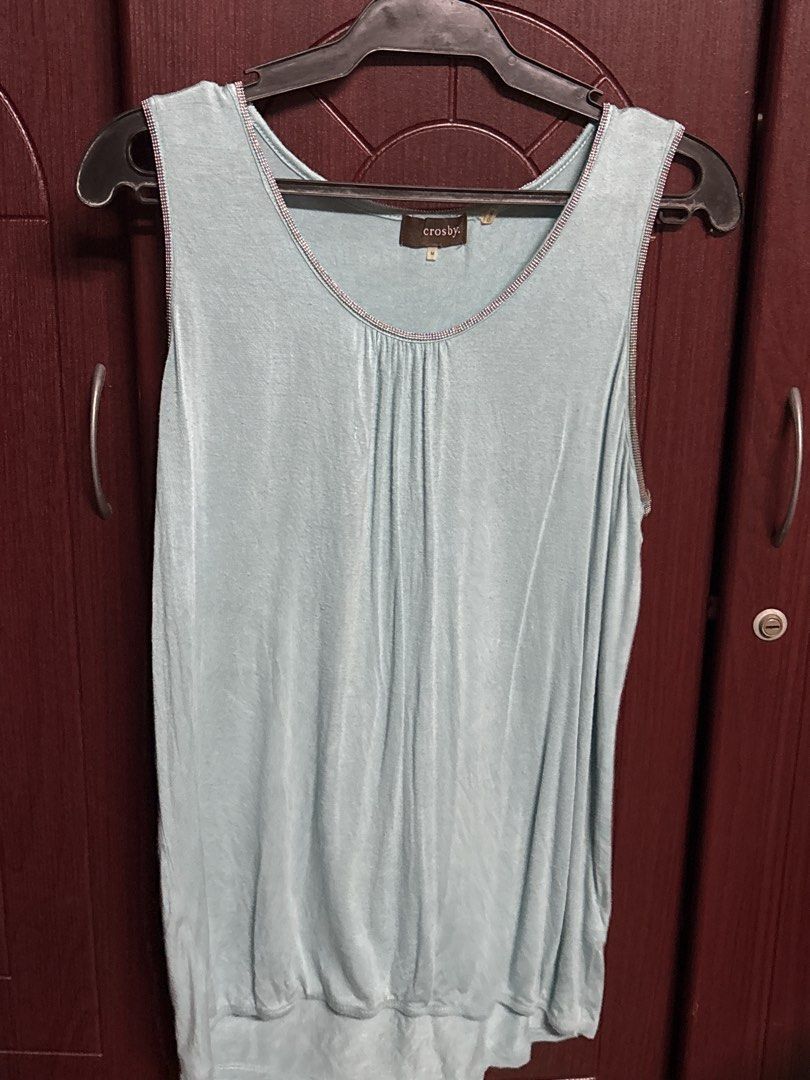 Crushy Sleeveless Top - Light Blue (Category: Sleeveless) located in Makati City. Submitted by clutterfairie (Listing ID 1442311406, Image 1). Description: - Light blue sleeveless top - Brand: Crushy - Gathered detail at the neckline - Elasticated hem - Soft, flowy material - Versatile: great for layering or wearing alone.