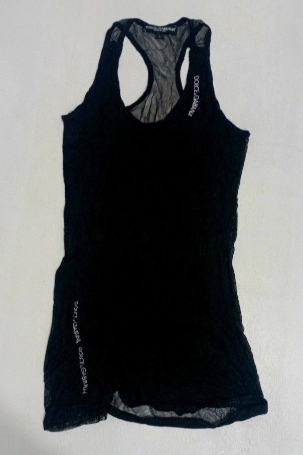 Dolce & Gabbana Tank Tops (Category: Luxury Apparel) located in Navotas City. Submitted by ms.soulana (Listing ID 1442210263, Image 1). Description: PREOWNED lightly Used DOLCE & GABBANA WOMENS TANK TOPS BLACK SMALL Cotton ,Mesh Stretch Flaws : Cut Washtag (NGA ) Good Condition 9/10 .
