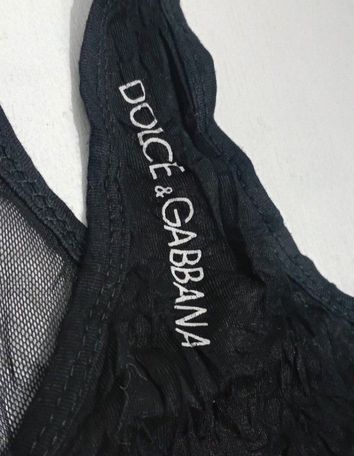 Dolce & Gabbana Tank Tops (Category: Luxury Apparel) located in Navotas City. Submitted by ms.soulana (Listing ID 1442210263, Image 2). Description: PREOWNED lightly Used DOLCE & GABBANA WOMENS TANK TOPS BLACK SMALL Cotton ,Mesh Stretch Flaws : Cut Washtag (NGA ) Good Condition 9/10 .