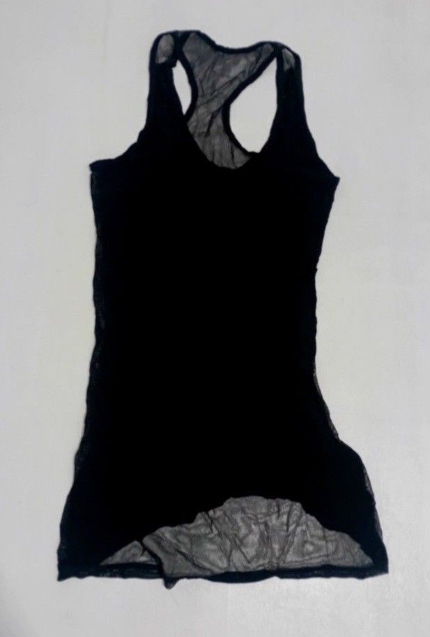 Dolce & Gabbana Tank Tops (Category: Luxury Apparel) located in Navotas City. Submitted by ms.soulana (Listing ID 1442210263, Image 3). Description: PREOWNED lightly Used DOLCE & GABBANA WOMENS TANK TOPS BLACK SMALL Cotton ,Mesh Stretch Flaws : Cut Washtag (NGA ) Good Condition 9/10 .