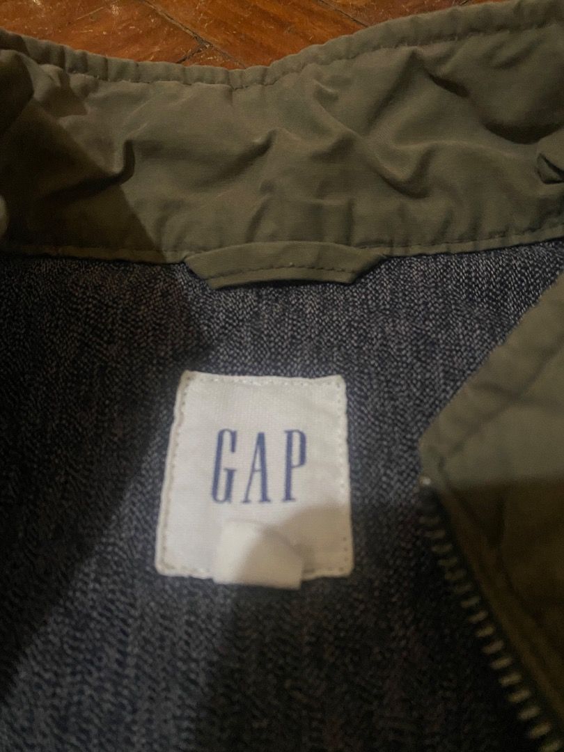 GAP olive green quilted vest (Category: Vests) located in Quezon City. Submitted by channelkahel (Listing ID 1442203775, Image 3). Description: - GAP olive green quilted vest - thrifted on ig, never used - no flaws, excellent condition !! - size medium but fits large .
