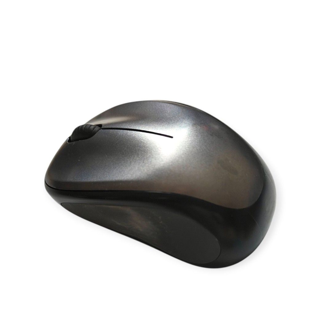 Grey Logitech M235 wireless mouse. It operates using a single AA battery for power. The device includes a USB Nano receiver for wireless connectivity.474898573517148160