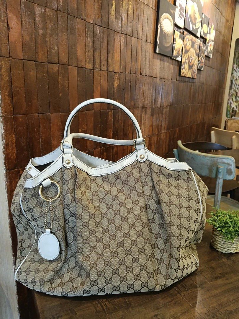 GUCCI CANVAS SUKEY TOTE BAG (Category: Luxury Bags & Wallets) located in Muntinlupa City. Submitted by bff_findsph (Listing ID 1442180319, Image 1). Description: GUCCI Diamante Sukey Interlocking G Tote Bag ₱30,000 Guaranteed Authentic • Rank AB •Large size • Clean interior and exterior • No stains • Leather remains in excellent condition with no rubs or discoloration • Corners are intact with no tears • No inclusions Authentication certificate i